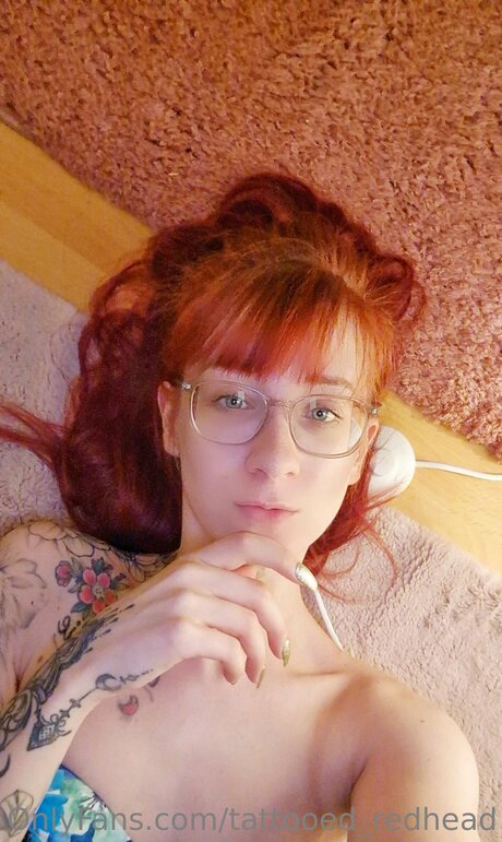 Tattooed Redhead